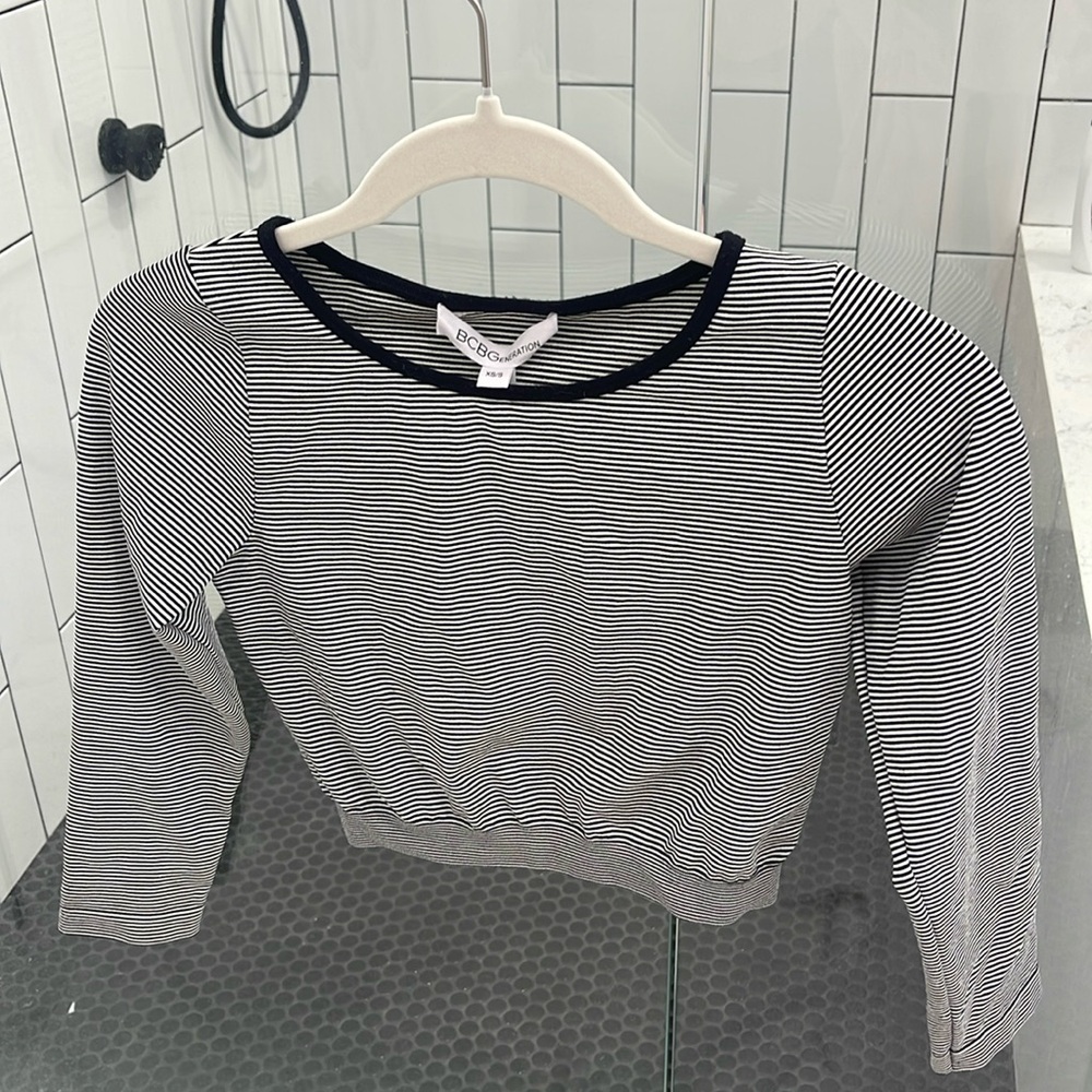 Brand New With Tags. BCBGeneration crop top. Black and white stripes. Size XS/S.